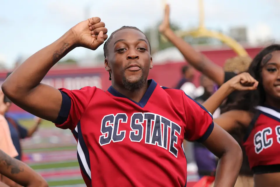 Bulldog fans celebrating during Homecoming Game Day
